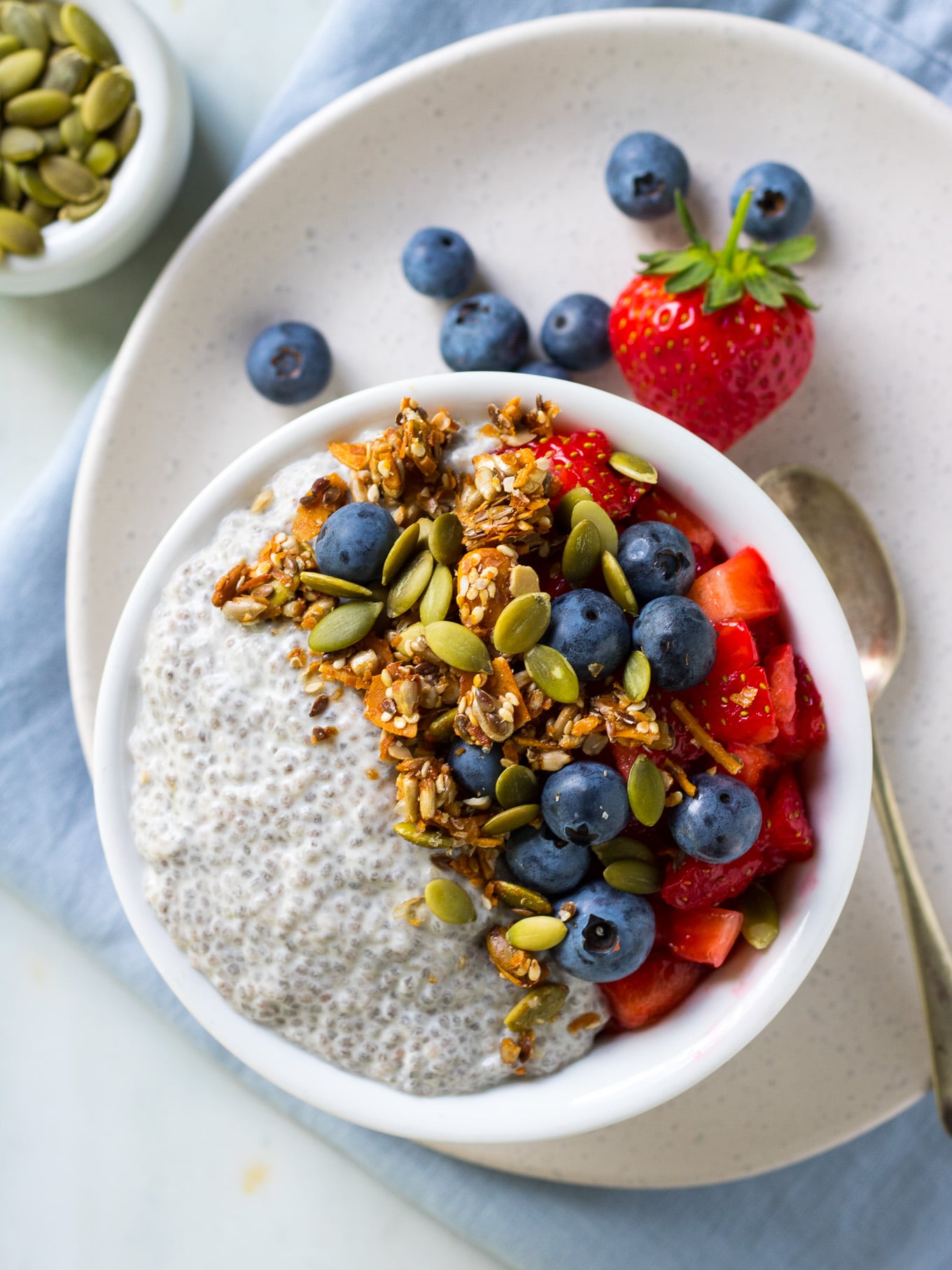 Vanilla Chia Pudding made with coconut milk, vanilla and maple syrup. Serve with fruit and granola for a #healthy breakfast! #chiapudding #dairyfree #breakfast