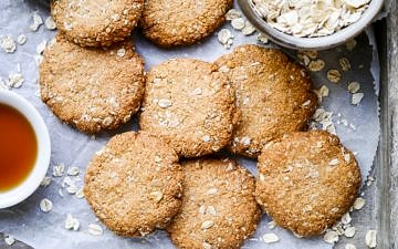 This easy buckwheat ANZAC cookies recipe is gluten free, dairy free and nut free. A simple vegan cookie with that classic combo of oats and coconut! Recipe by Nourish Everyday