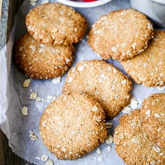 This easy buckwheat ANZAC cookies recipe is gluten free, dairy free and nut free. A simple vegan cookie with that classic combo of oats and coconut! Recipe by Nourish Everyday