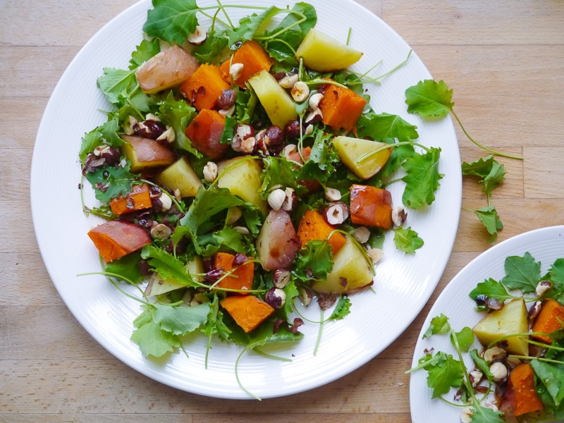 When you can't decide between potato and sweet potato, the answer is to clearly have a little bit of both. They pair perfectly with crunchy hazelnuts and a zesty, lemon-infused dressing in this recipe.