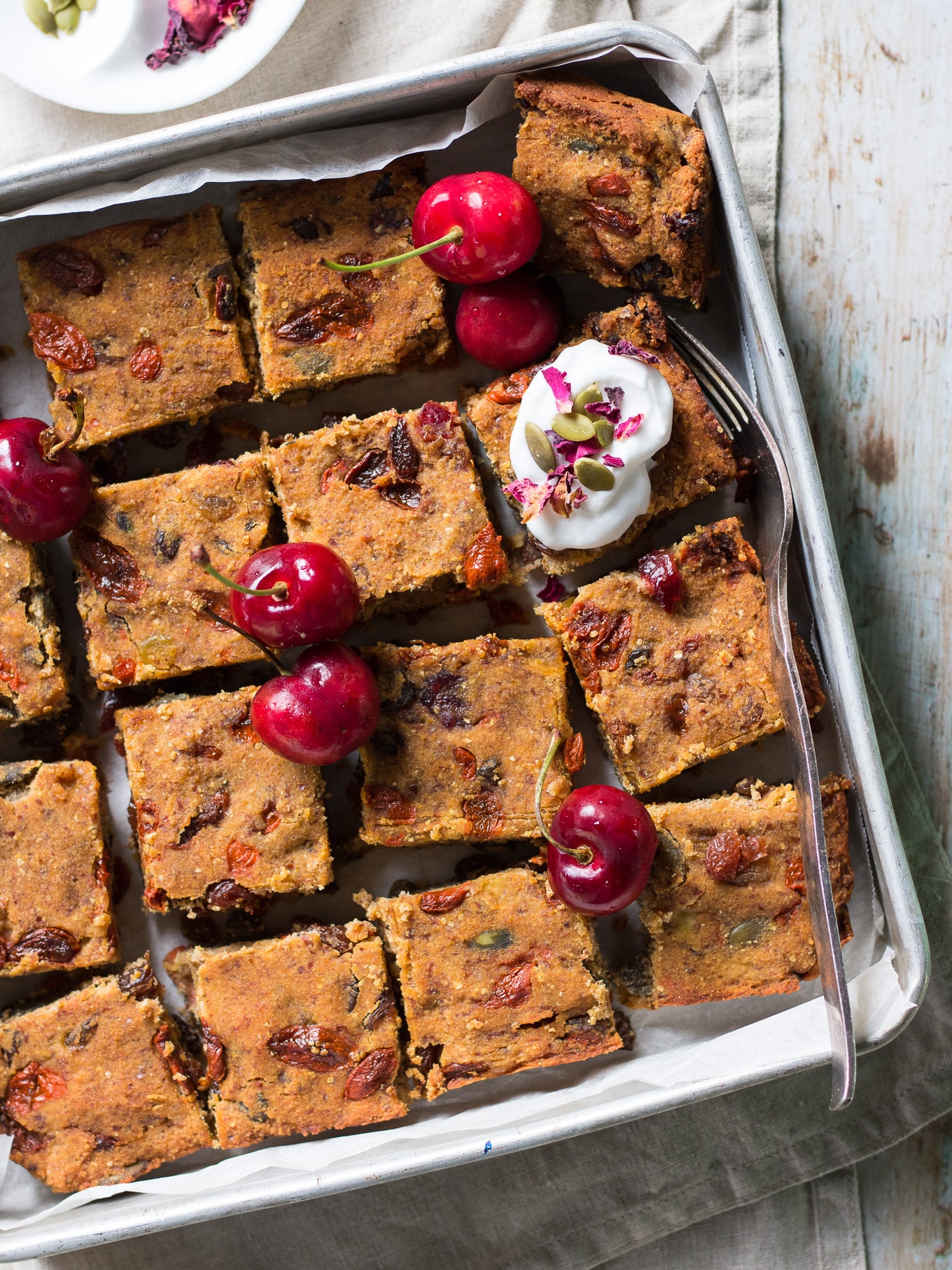 Nut Free Vegan Fruit Slice - a #glutenfree healthier sweet treat loaded with dried fruit, banana, coconut flour and tahini. So yum! #vegan #fruitcake #nutfree