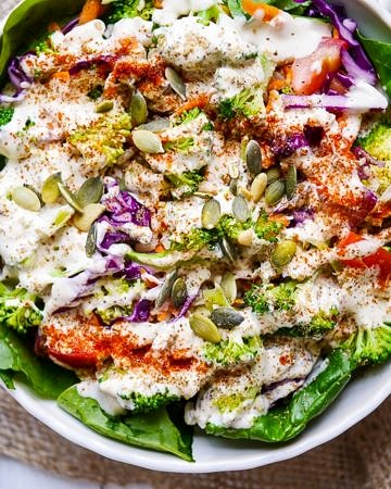 This yoghurt tahini sauce recipe is so versatile and can be used as a dressing or a dip. Gluten free and sugar free, it's so easy and goes with everything! Recipe via wordpress-6440-15949-223058.cloudwaysapps.com