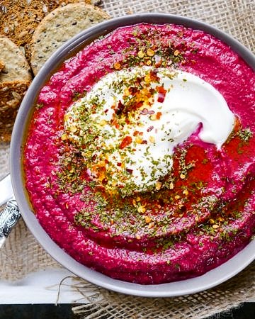 Dairy free Beetroot Lentil Dip recipe. Easy to make, bright, healthy and delicious! A great healthy appetiser or snack that's gluten free and vegan. Recipe via wordpress-6440-15949-223058.cloudwaysapps.com