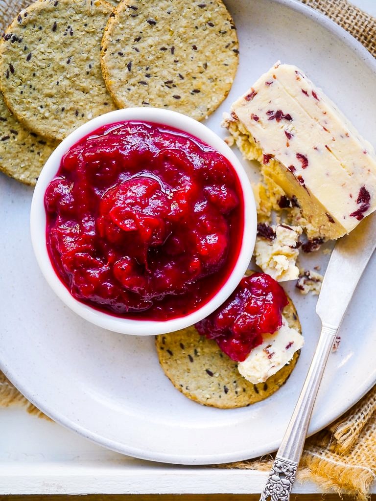 This Vanilla Maple Cranberry Sauce is really quick, simple and easy to make. Naturally sweetened with maple syrup, it's vegan and paleo friendly.