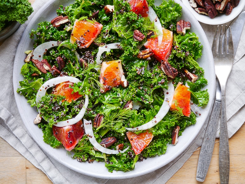 A vibrant, healthy massaged kale and blood orange salad. Finished with crunchy pecans! Gluten free, dairy free and vegan friendly