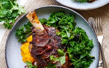 Balsamic slow cooker lamb shanks made with dried thyme and a rich flavoursome tomato sauce. Gluten free, dairy free and really easy to make! Recipe at wordpress-6440-15949-223058.cloudwaysapps.com