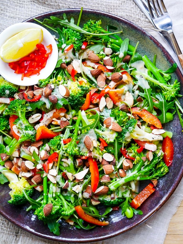 This crunchy broccoli edamame salad is finished with a delicious creamy miso dressing. Dairy free, gluten free and vegan friendly, and packed with filling plant protein! Via nourisheveryday.com