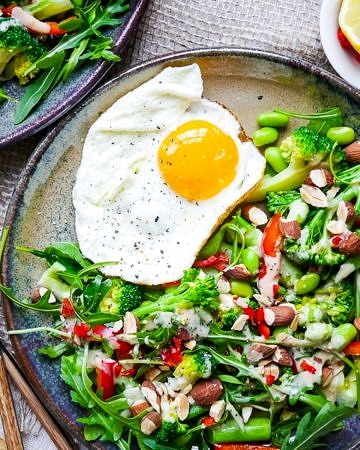 This crunchy broccoli edamame salad is finished with a delicious creamy miso dressing. Dairy free, gluten free and vegan friendly, and packed with filling plant protein! Via nourisheveryday.com