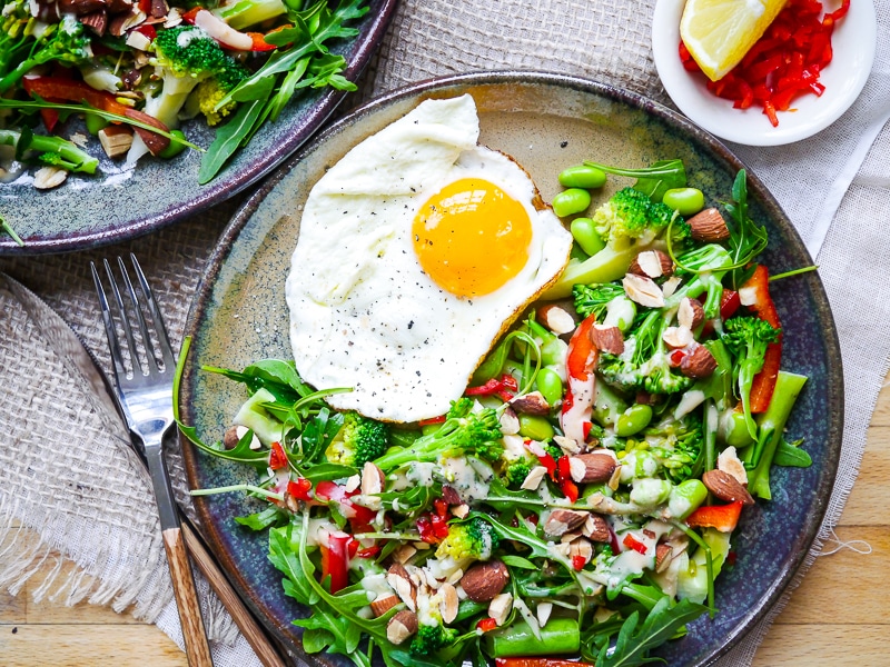 This crunchy broccoli edamame salad is finished with a delicious creamy miso dressing. Dairy free, gluten free and vegan friendly, and packed with filling plant protein! Via nourisheveryday.com
