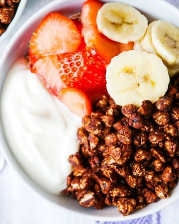 Crispy Chocolate Puffed Buckwheat Cereal - easy healthy Coco Pops! Naturally sweetened and nothing artificial. Gluten free, dairy free, and a vegan option. Recipe via nourisheveryday.com