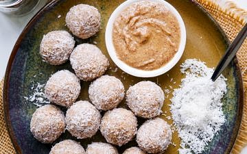 No Food Processor Protein Balls arranged on a blue ceramic plate