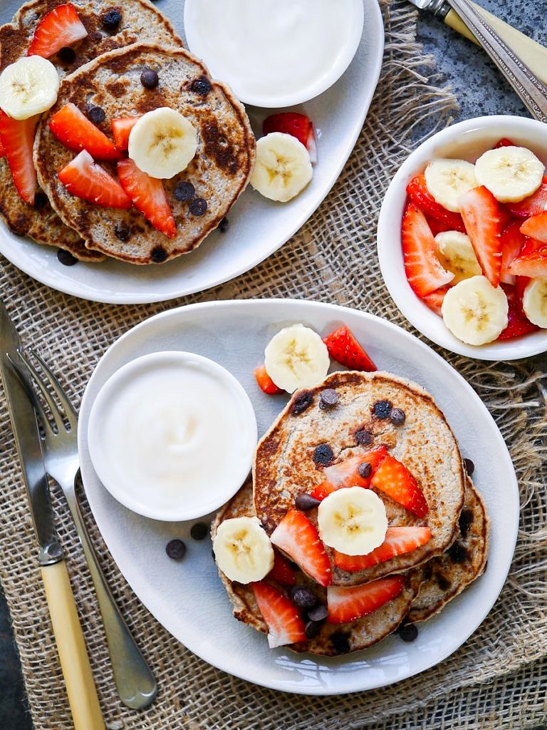 These Vegan Chocolate Chip Banana Pancakes are made gluten free with buckwheat flour, and only naturally sweetened. A healthy but indulgent breakfast!
