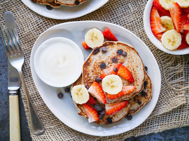 These Vegan Chocolate Chip Banana Pancakes are made gluten free with buckwheat flour, and only naturally sweetened. A healthy but indulgent breakfast!