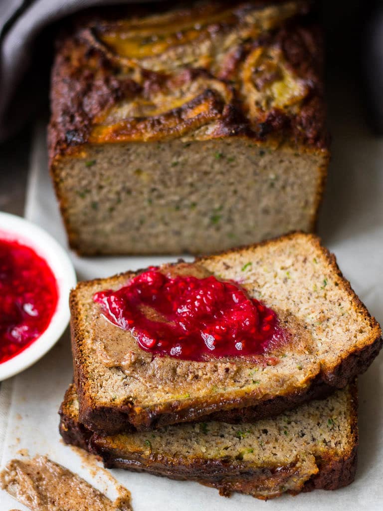 Grain free Zucchini Banana Bread is a low sugar loaf naturally sweetened with bananas and maple syrup. Dairy free, gluten free and paleo, enjoy a slice for breakfast or a healthy snack!