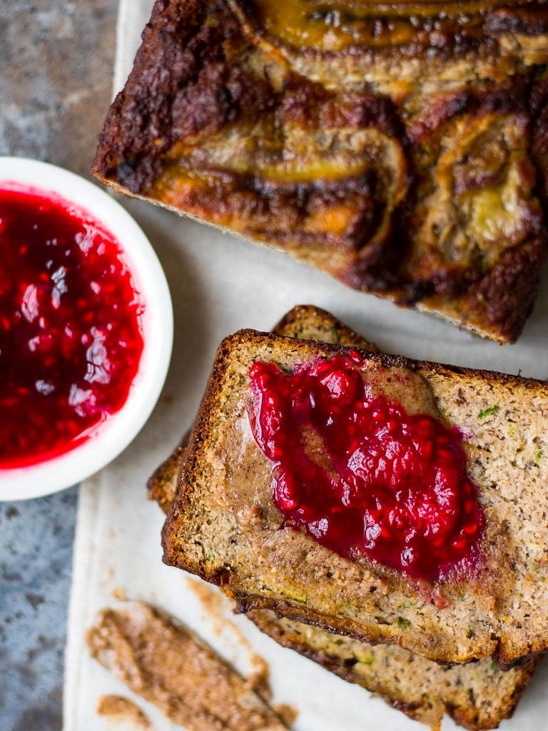 Grain free Zucchini Banana Bread is a low sugar loaf naturally sweetened with bananas and maple syrup. Dairy free, gluten free and paleo, enjoy a slice for breakfast or a healthy snack!