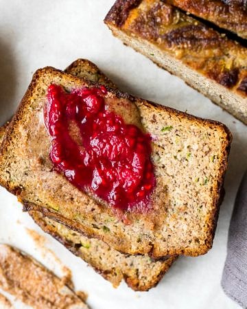 Grain free Zucchini Banana Bread is a low sugar loaf naturally sweetened with bananas and maple syrup. Dairy free, gluten free and paleo, enjoy a slice for breakfast or a healthy snack!