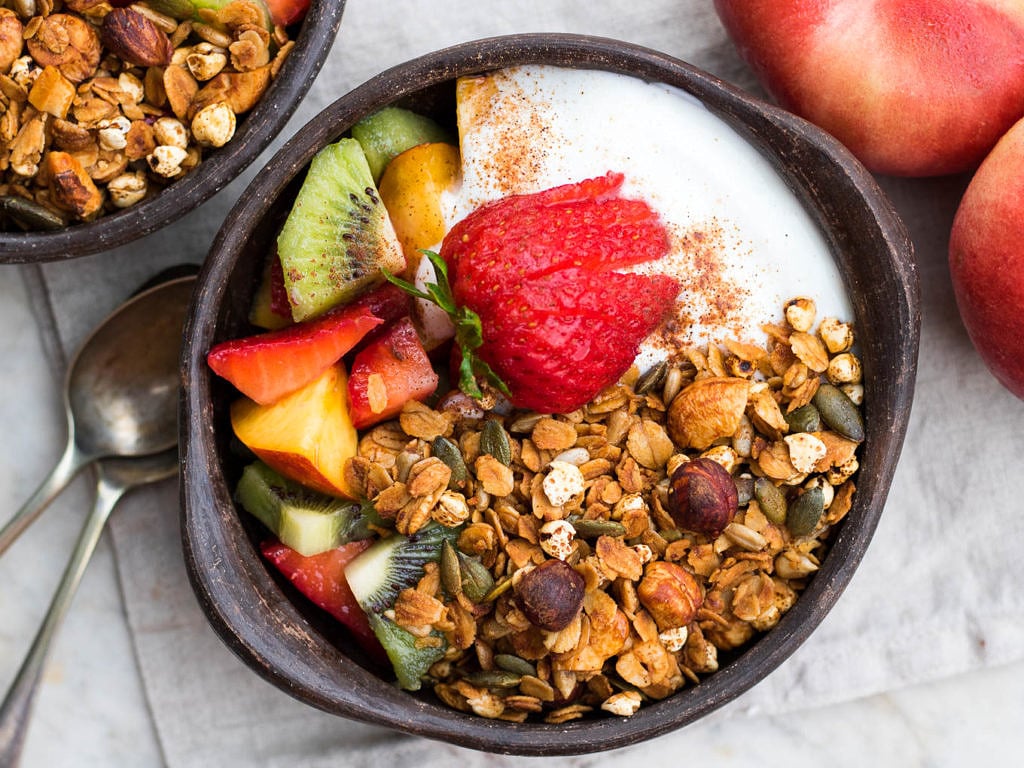 Crisp honey olive oil granola made with simple pantry ingredients. All natural, low sugar, plus it's gluten free and dairy free! An easy healthy breakfast.