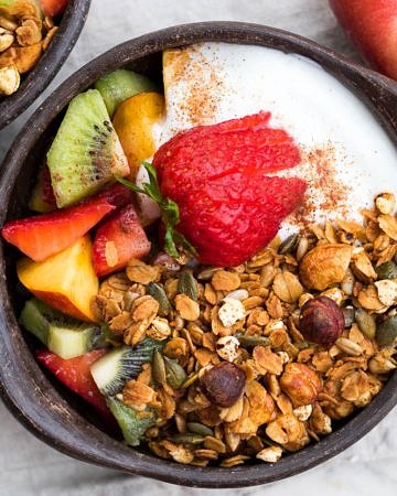 Crisp honey olive oil granola made with simple pantry ingredients. All natural, low sugar, plus it's gluten free and dairy free! An easy healthy breakfast.