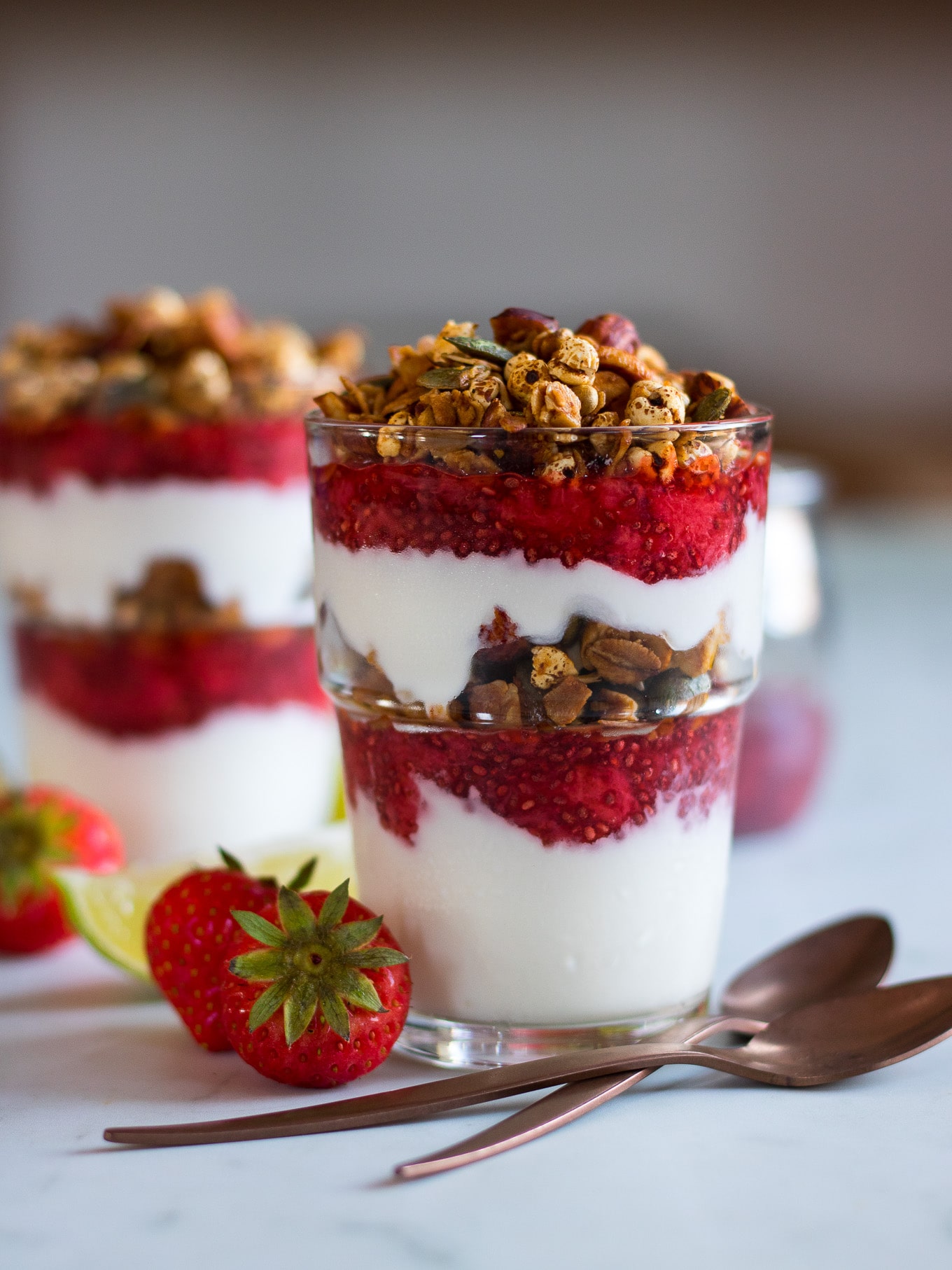 Strawberry Lime Chia Yoghurt Parfaits make a beautiful but simple breakfast, snack or even a healthy dessert! They're perfect to meal prep and can be made gluten free and dairy free too. #glutenfree #yoghurtparfait