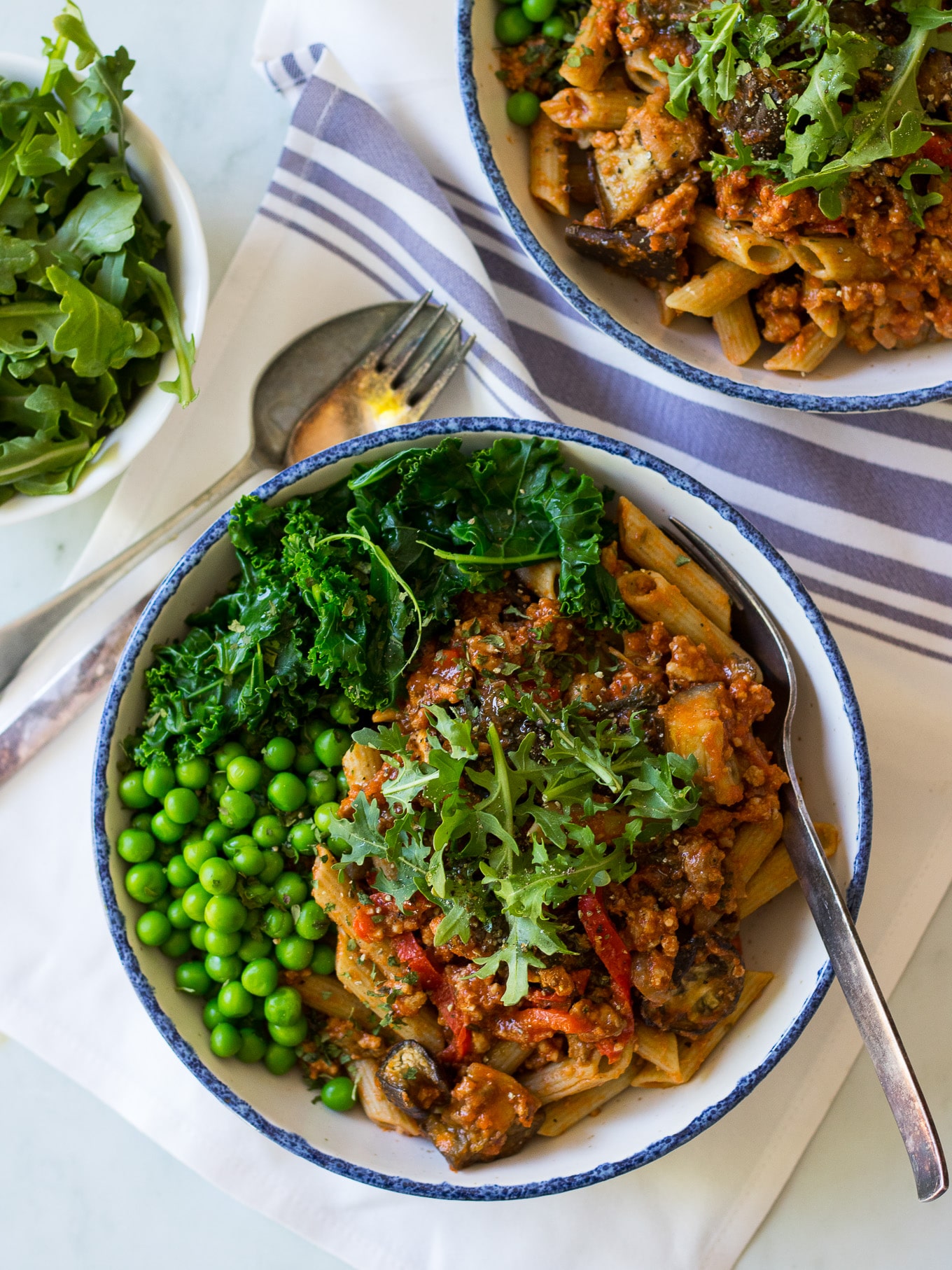 Roast Eggplant and Kale Bolognese - a healthy bolognese sauce made gluten free and dairy free. Freezes well and easy! Served over gluten free legume pasta, you could also make this paleo and use zoodles. #healthybolognese #glutenfreepasta