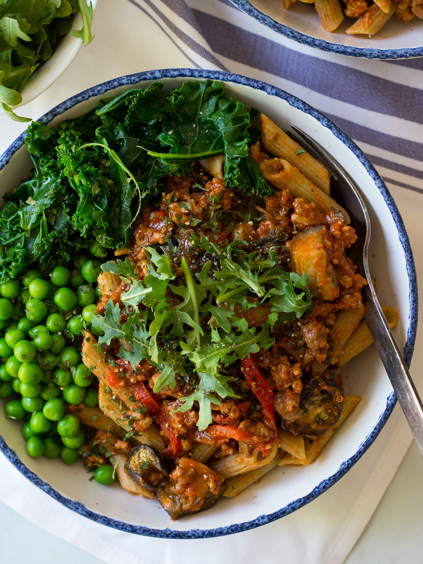 Roast Eggplant and Kale Bolognese - a healthy bolognese sauce made gluten free and dairy free. Served here over gluten free pasta, you could also go paleo and use vegetable noodles like zoodles. #healthybolognese #glutenfree