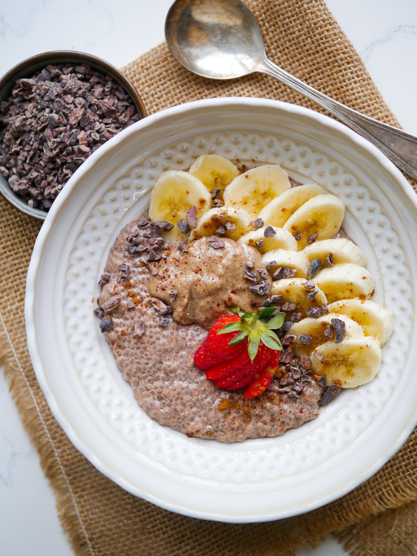 Recipe for chunky monkey chia pudding (gluten free, dairy free) This makes a great healthy breakfast or dessert! Cacao chia pudding, banana, peanut butter and cacao nibs. #cacao #chiaseeds #healthybreakfast #glutenfree