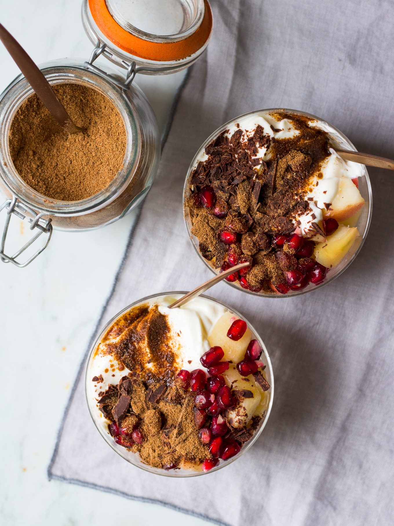 Chai Yoghurt Dessert Pots made with DIY chai latte mix! Juicy fruit, creamy yoghurt (dairy or coconut), grated chocolate and chai spices. A super easy healthy dessert that feels decadent! #healthydessert #glutenfree #dessertpots