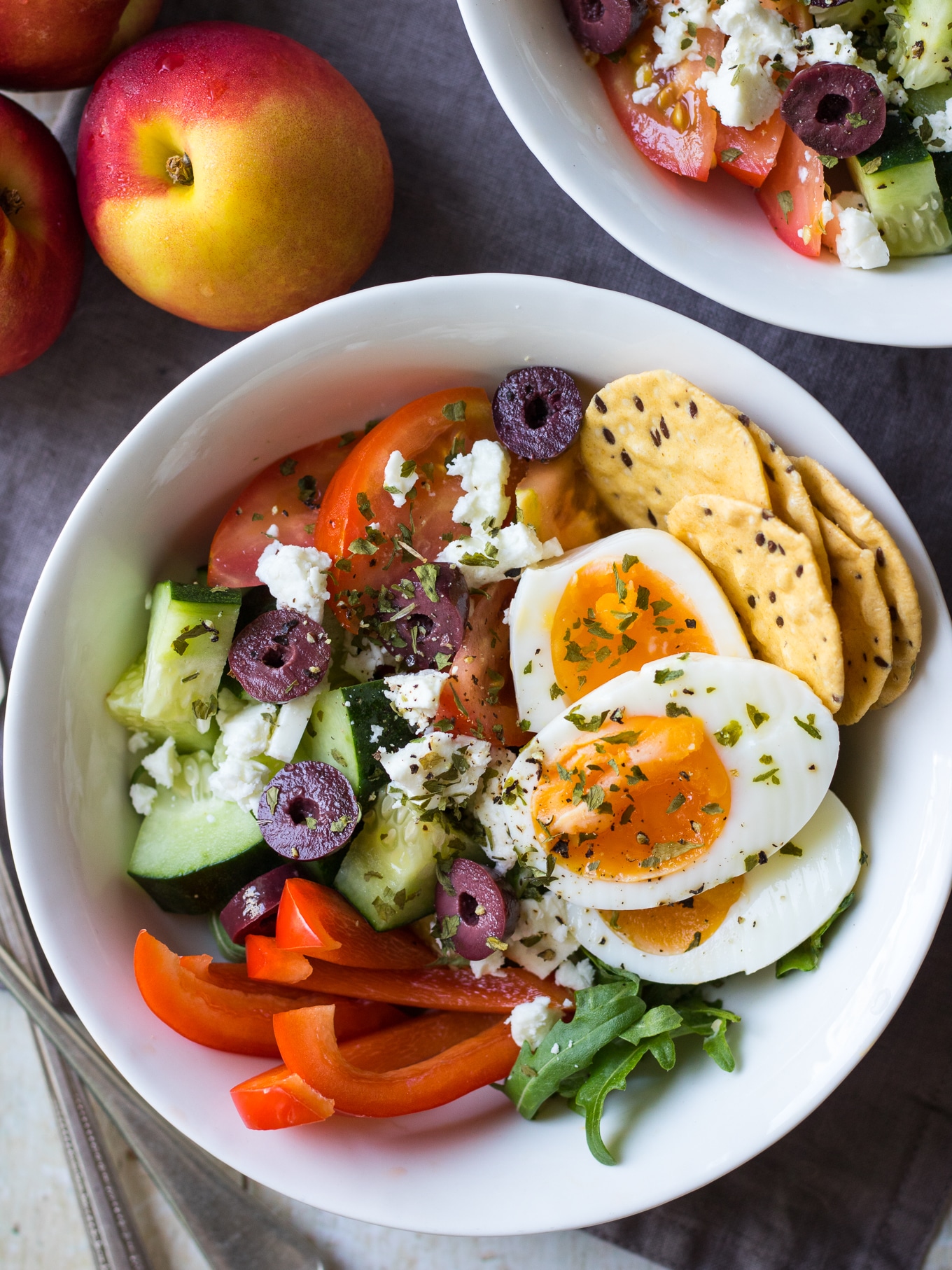 Meal prep breakfast bowls Greek style! Take boiled eggs and add cucumber, tomatoes, capsicum, feta and olives. Loads of fresh veggies and protein will give you the best healthy start to the day! #breakfastbowl #mealprep #glutenfree #breakfastsalad