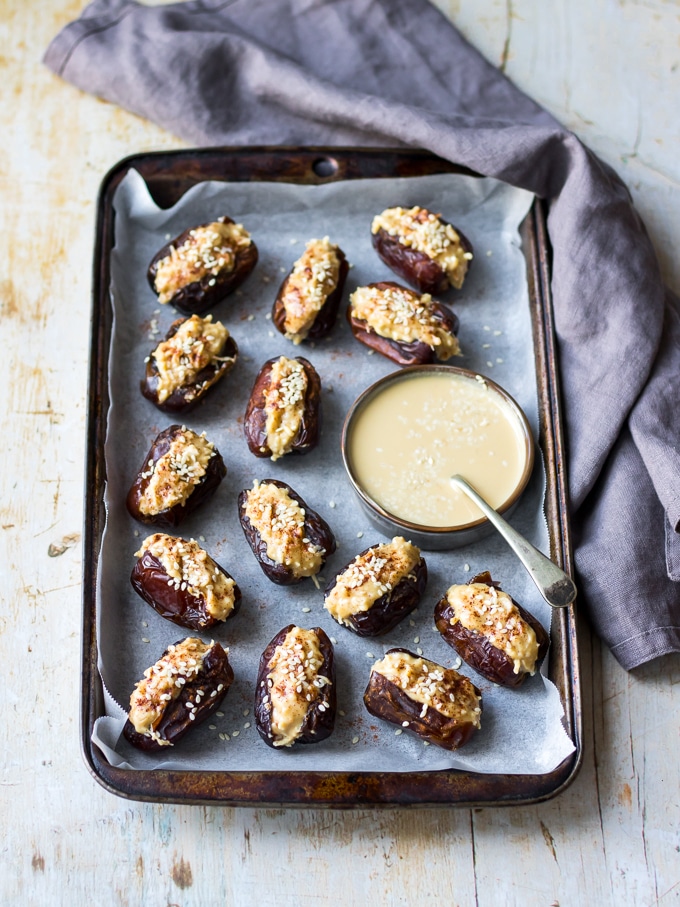 coconut tahini stuffed dates on a vintage tray