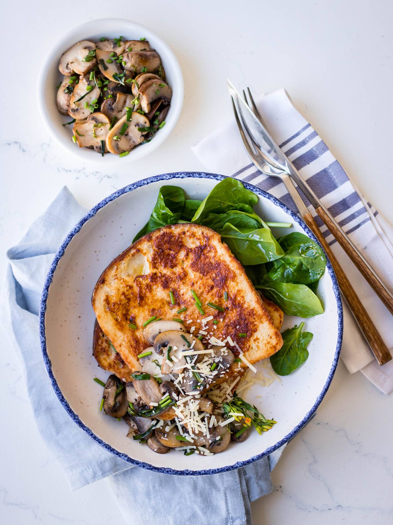 Savoury french toast with mushrooms and grated parmesan