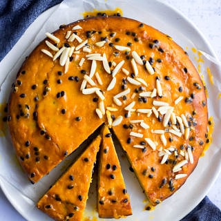 passionfruit yoghurt cake with passionfruit glaze and almonds