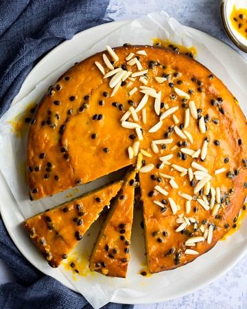 passionfruit yoghurt cake with passionfruit glaze and almonds