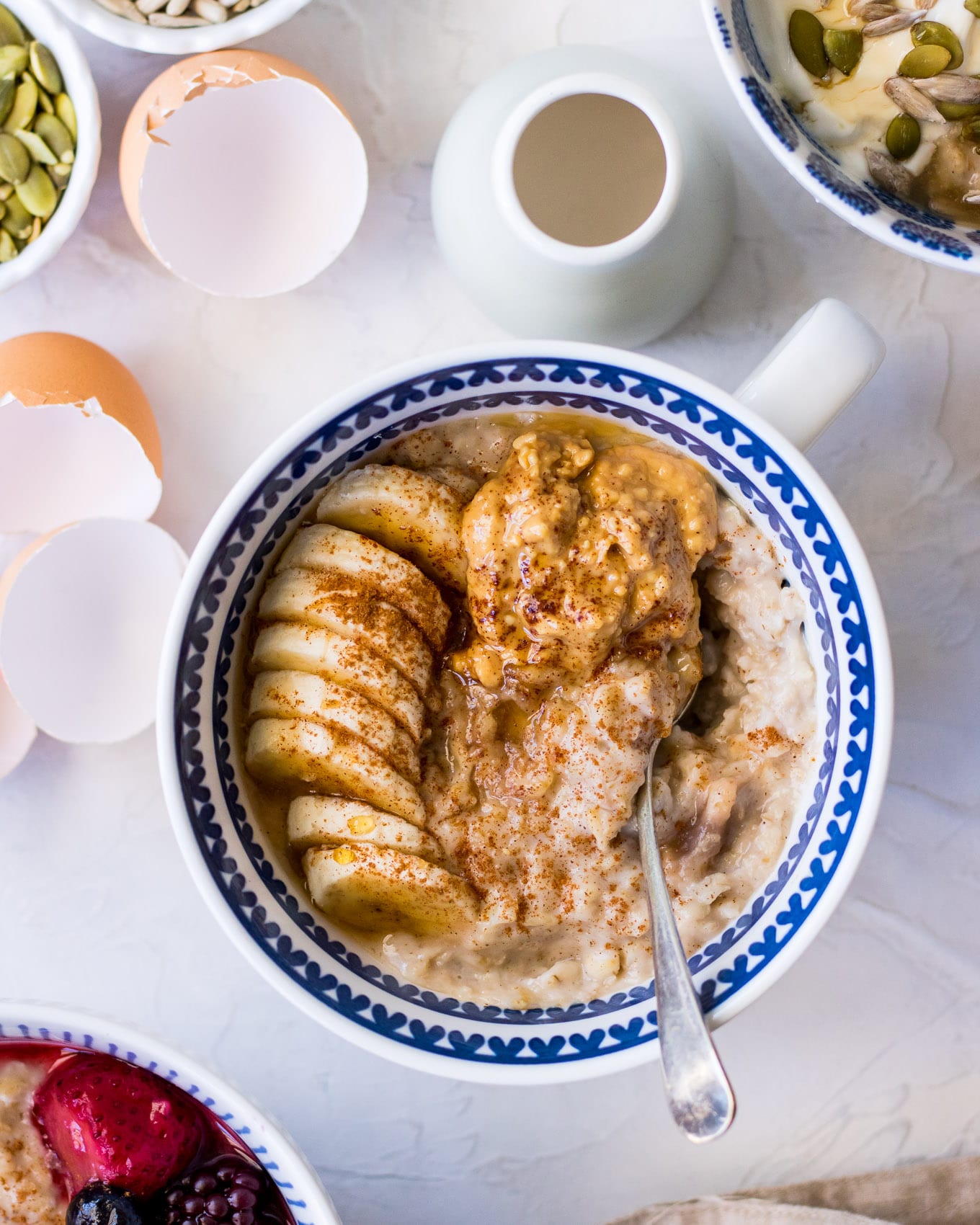 Banana Porridge topped with peanut butter and sliced banana