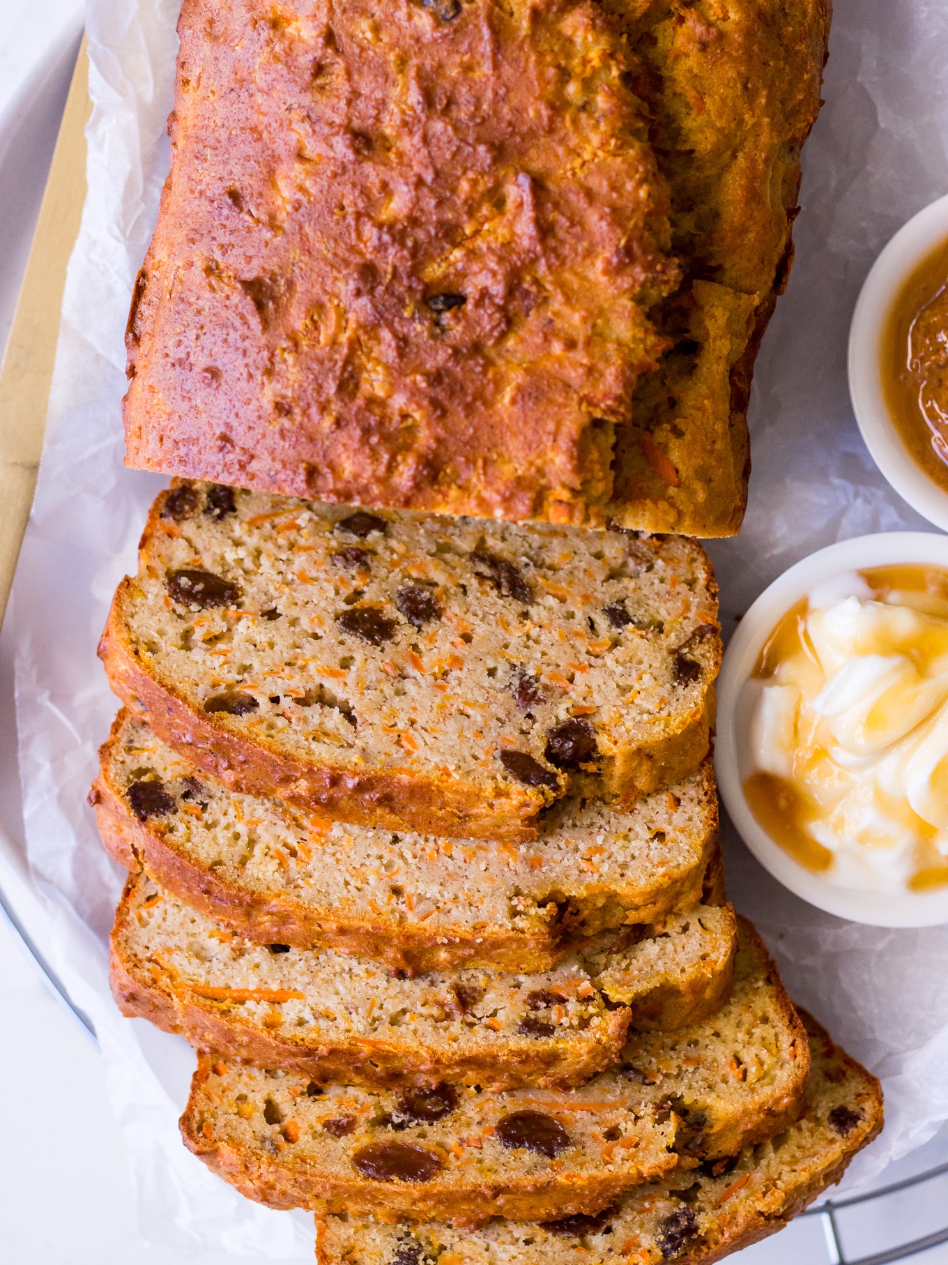 Close up sliced banana, carrot and sultana loaf cake
