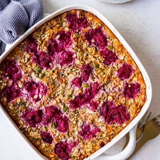 Carrot and Raspberry Baked Oatmeal in a white square dish