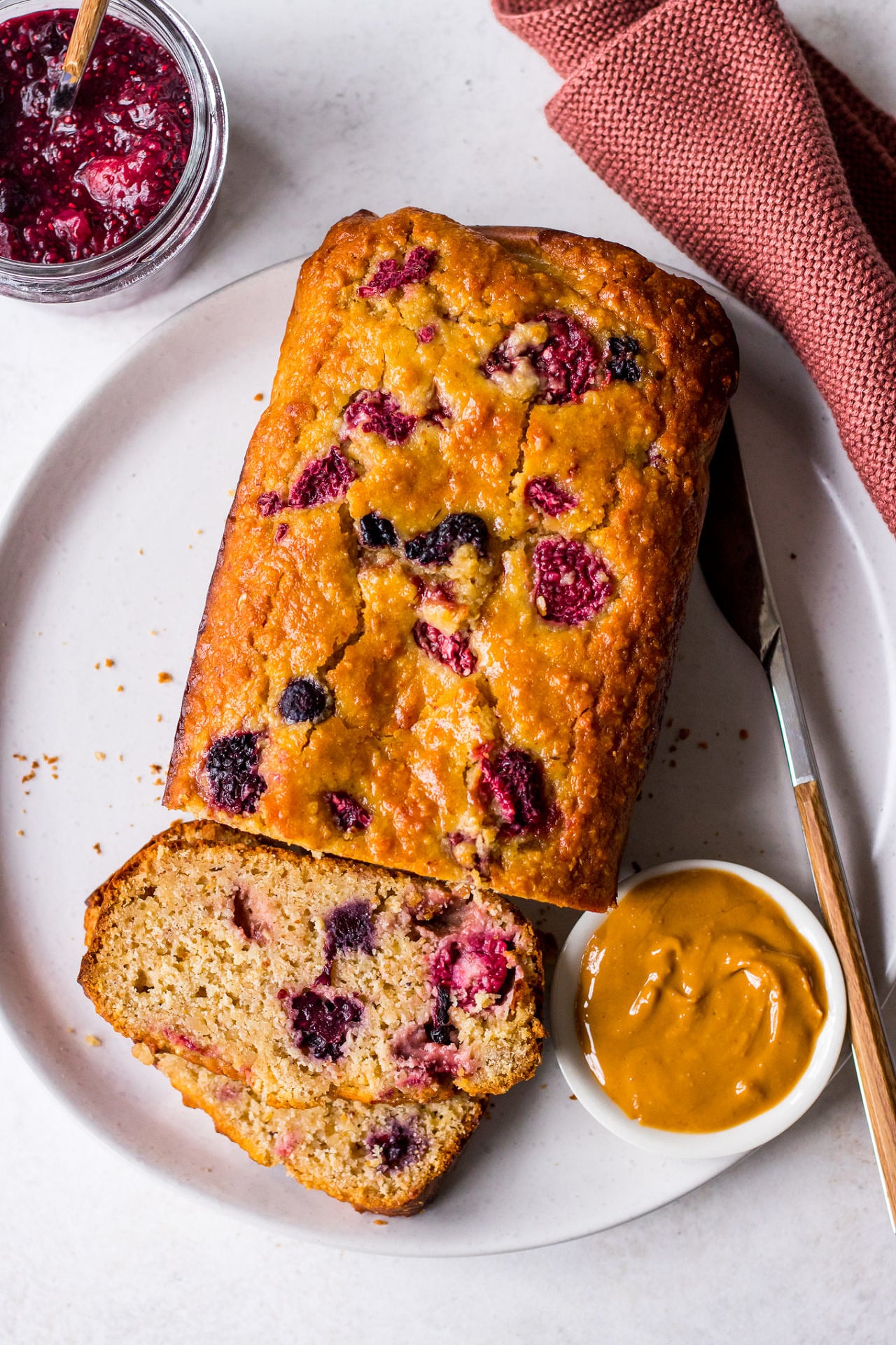 Sliced berry lemon yoghurt loaf cake with peanut butter