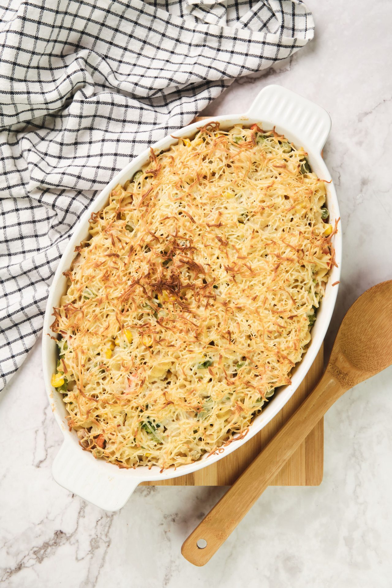 Tuna pasta casserole in an oval baking dish