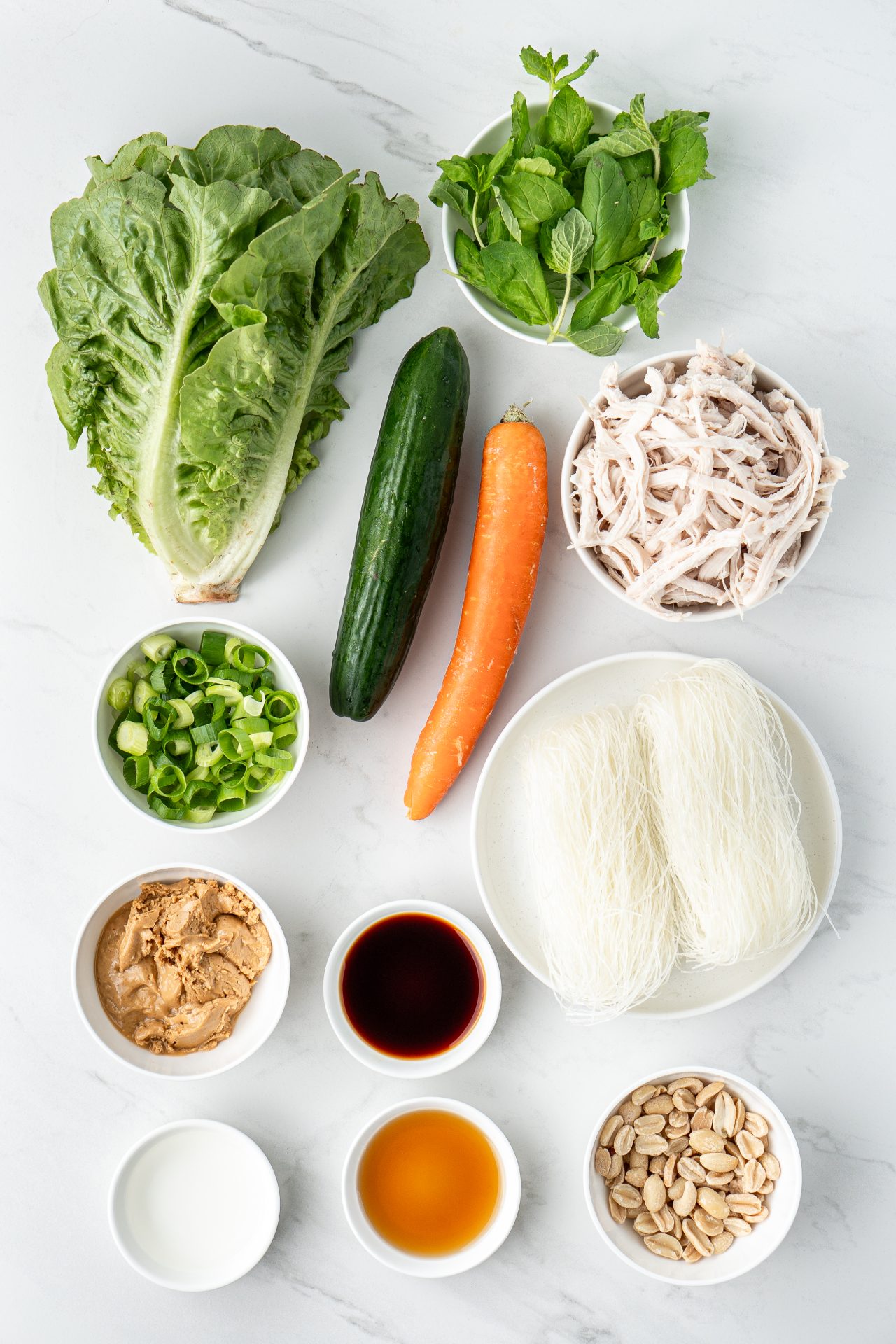 Ingredient flatlay for healthy vermicelli noodle bowls with peanut butter sauce | Nourish Every Day