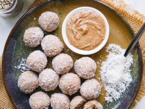 No Food Processor Protein Balls arranged on a blue ceramic plate